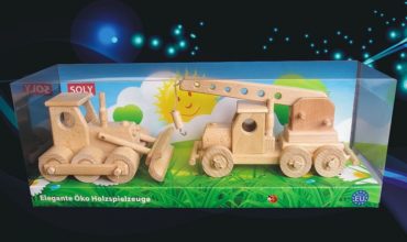 Kranspielzeug aus Holz Bulldozer und Kran in einer Geschen